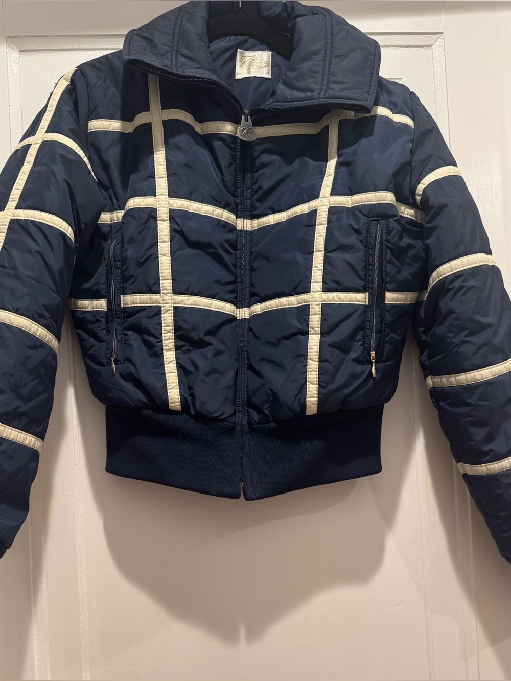 Women’s Roffe Retro Navy Jacket with Cream grid pattern.  perfect for apres Ski